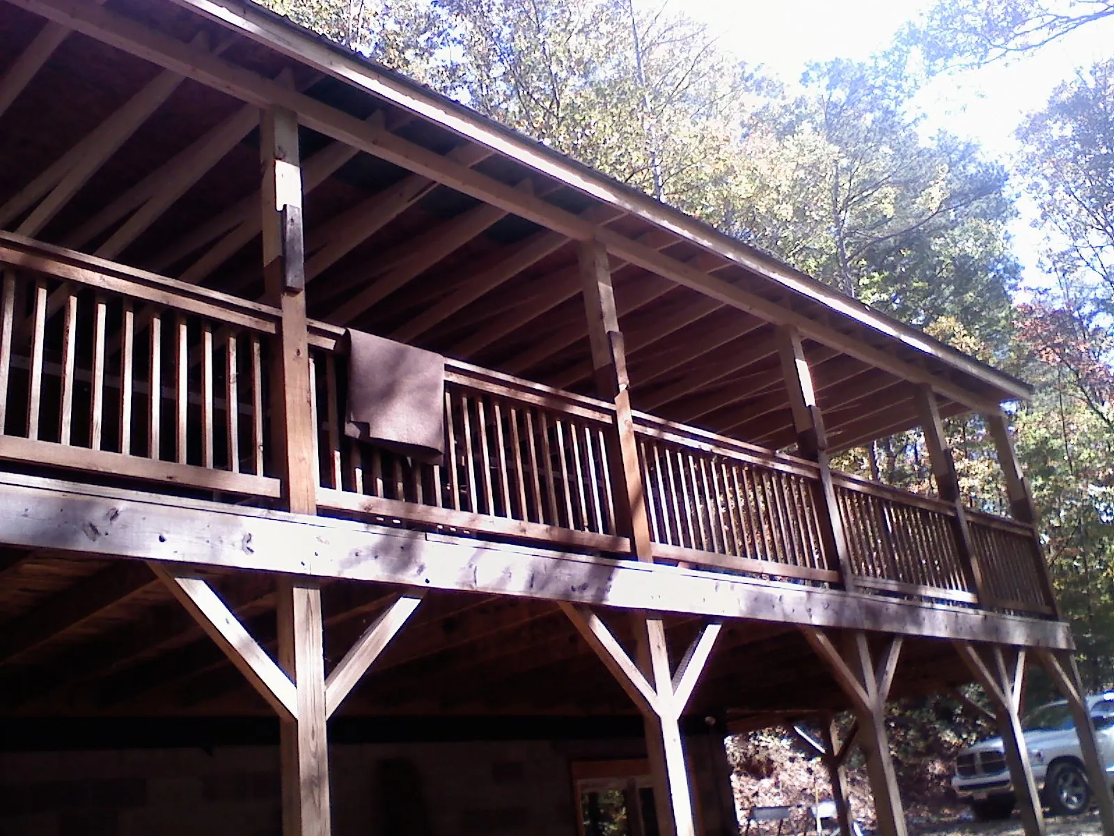 Timber framing under a new elevated porch and deck — Roof Leak Repair in Manitou Springs by Roofing Brothers